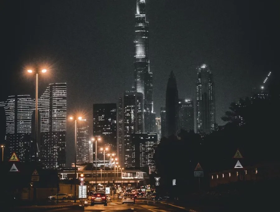 Night Dubai road with light trails and smooth tra…